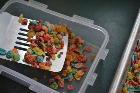 Putting cereal in storage container